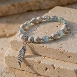 Bracelet "Plume Légère" en Howlite & Aigue-Marine - 17cm - L'Arbre des Chakras