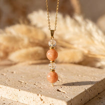 Pendentif "Aube Claire" en Pierre de Soleil & Cristal de Roche - - L'Arbre des Chakras